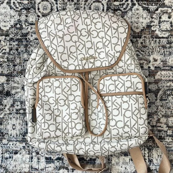 Calvin Klein Backpack Monogram Logo CK Print Drawstring Flap Bag Embossed Monogram Backpack | Calvin Klein main image 3